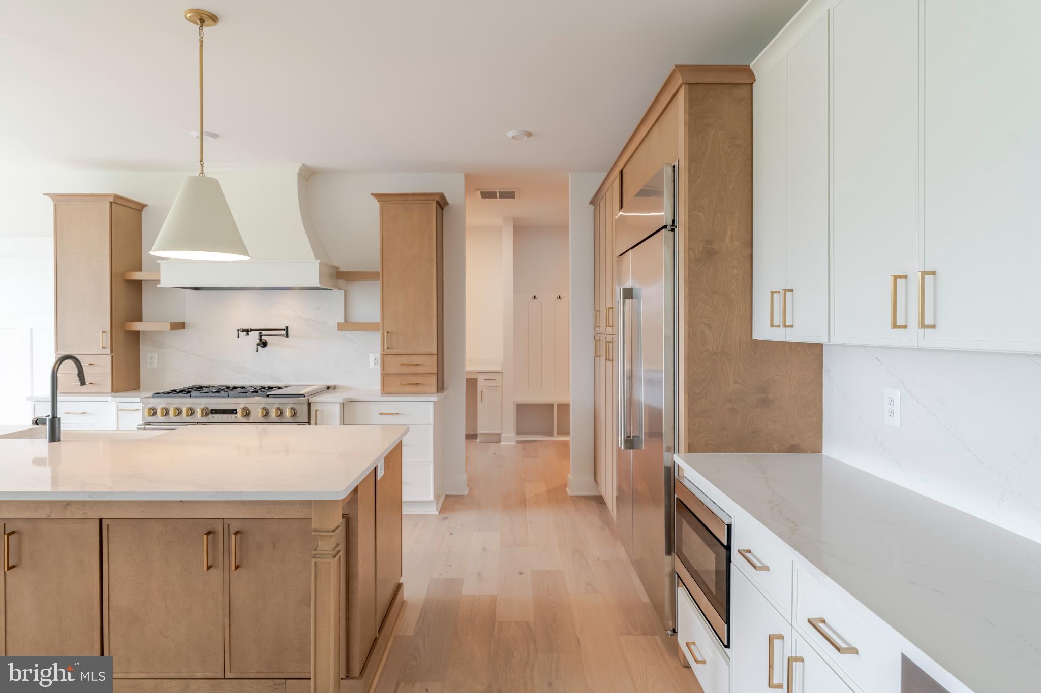 623 Traveller Court Lothian, MD 20711 - Photo 25 of 76 Modern kitchen with elegant wood accents.