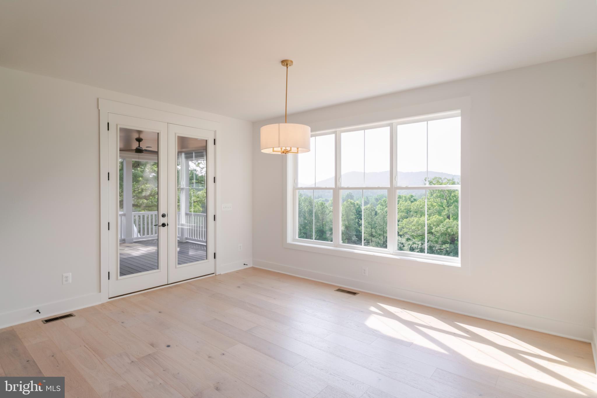 623 Traveller Court Lothian, MD 20711 - Photo 27 of 76 Bright, airy space with scenic views.