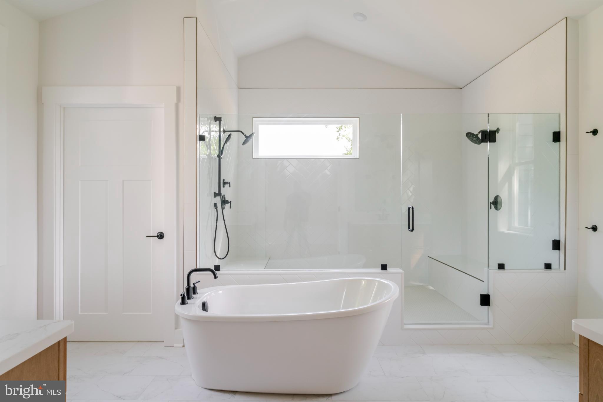 623 Traveller Court Lothian, MD 20711 - Photo 34 of 76 Sleek modern bathroom with elegant tub.