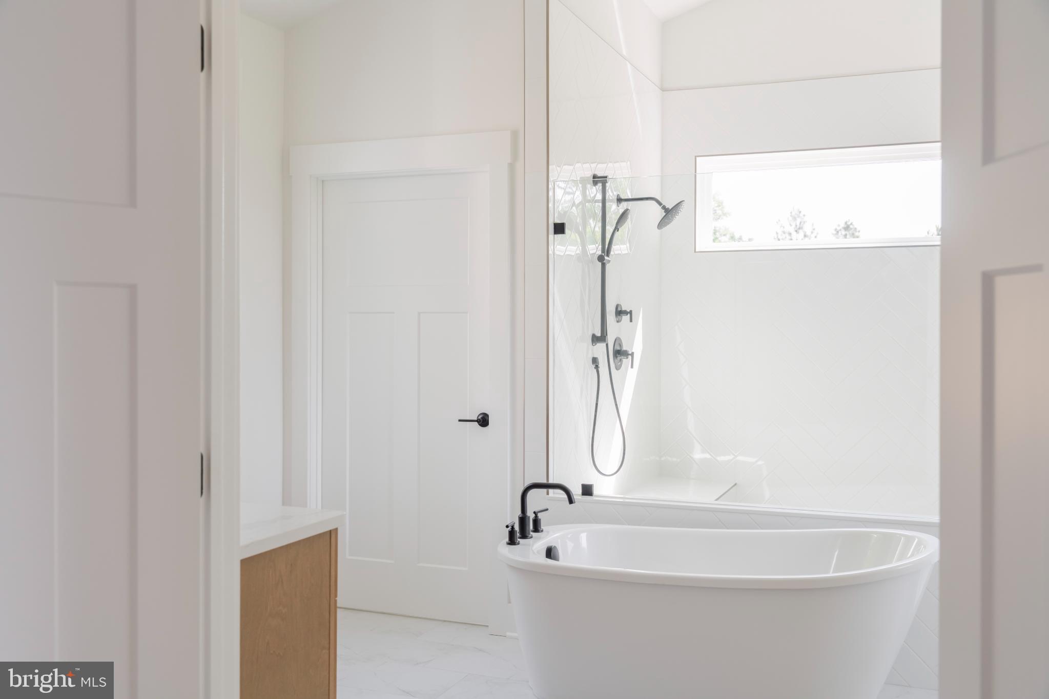 623 Traveller Court Lothian, MD 20711 - Photo 35 of 76 Sleek modern bathroom with serene ambiance.