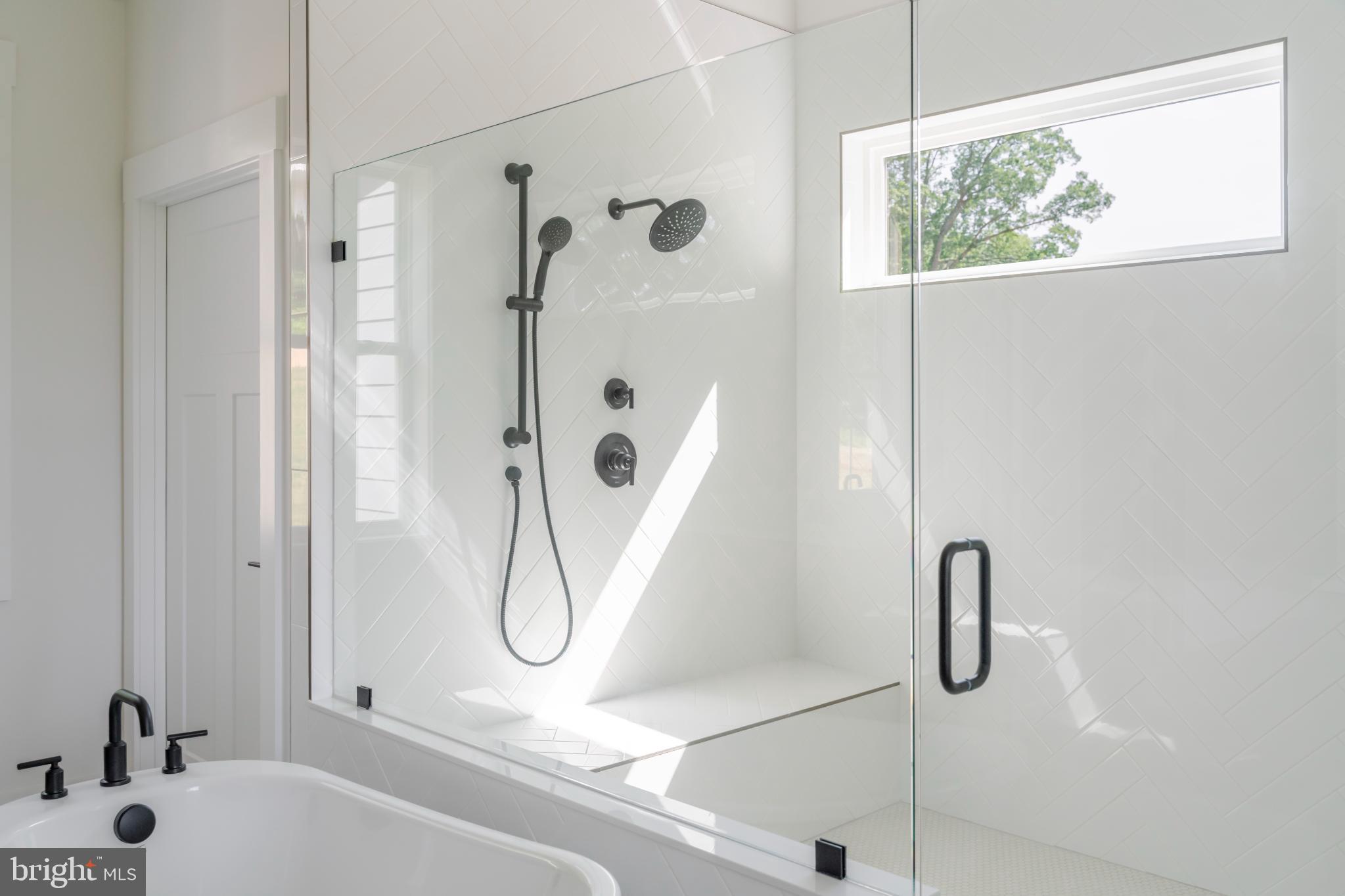 623 Traveller Court Lothian, MD 20711 - Photo 37 of 76 Sleek modern bathroom with glass shower.