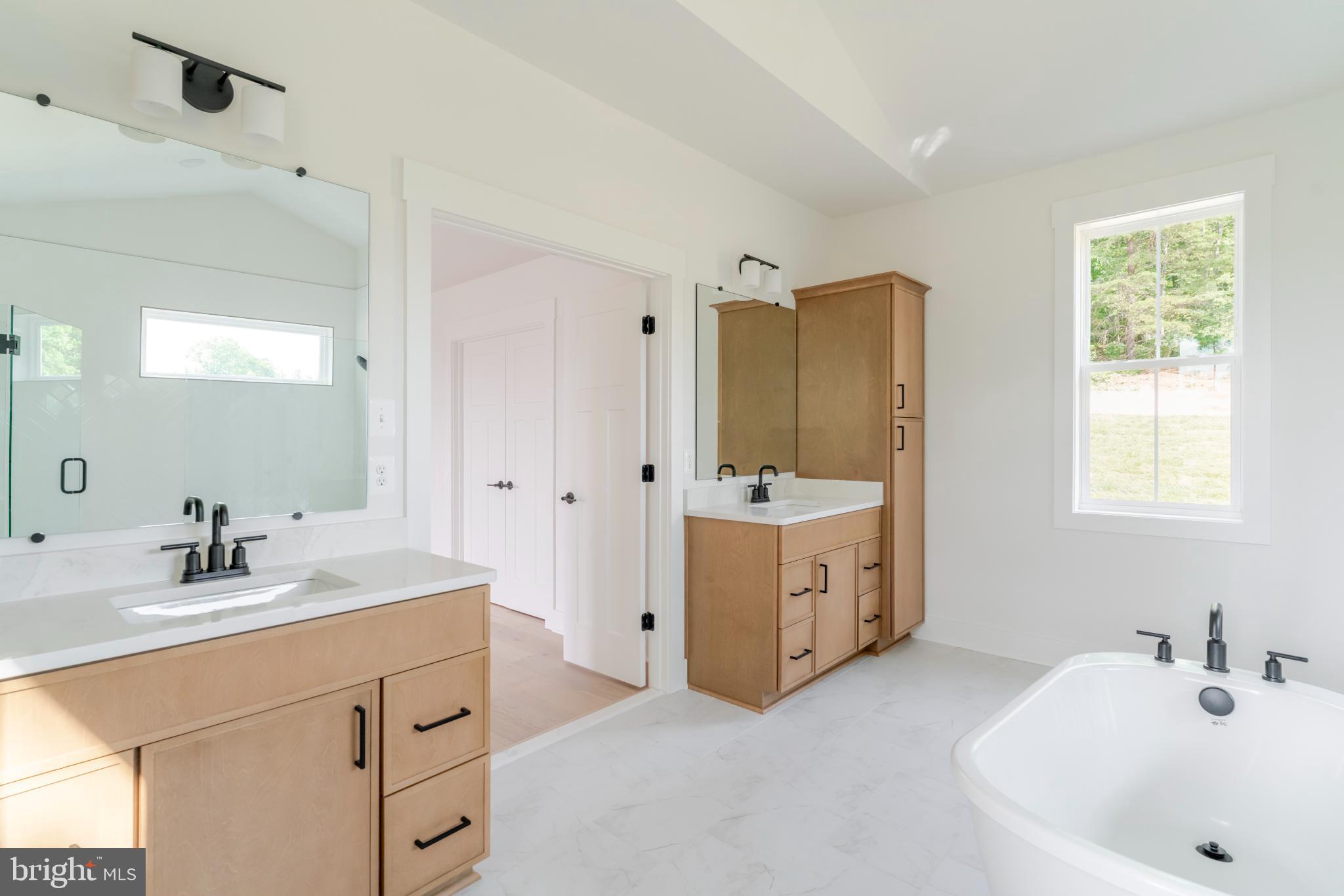 623 Traveller Court Lothian, MD 20711 - Photo 39 of 76 Modern bathroom with sleek design elements.