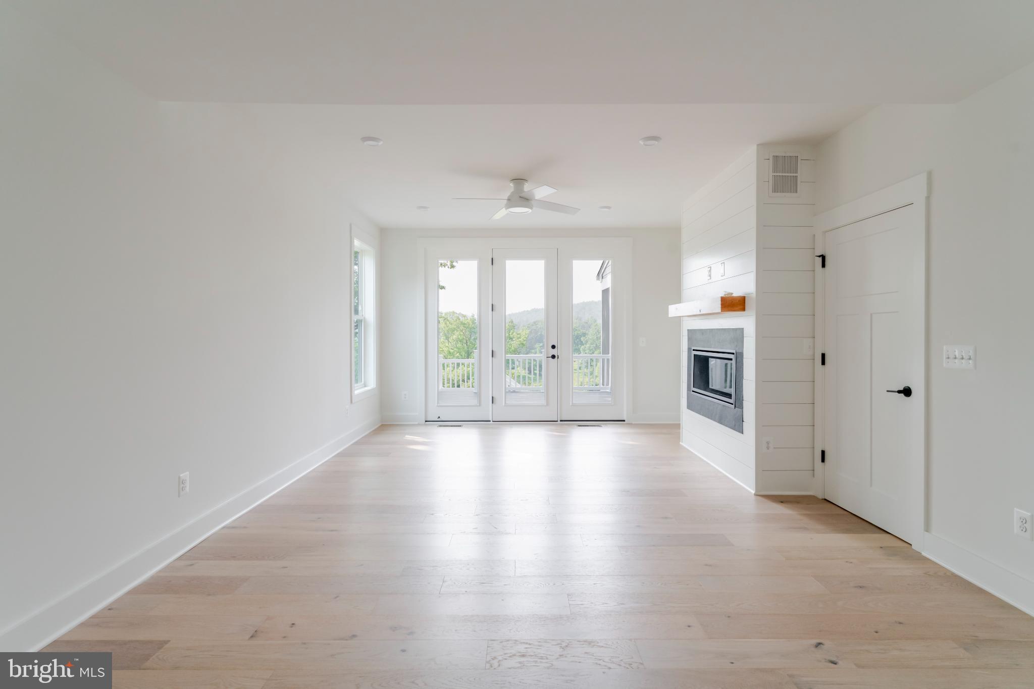 623 Traveller Court Lothian, MD 20711 - Photo 40 of 76 Bright and airy open space with serene views.