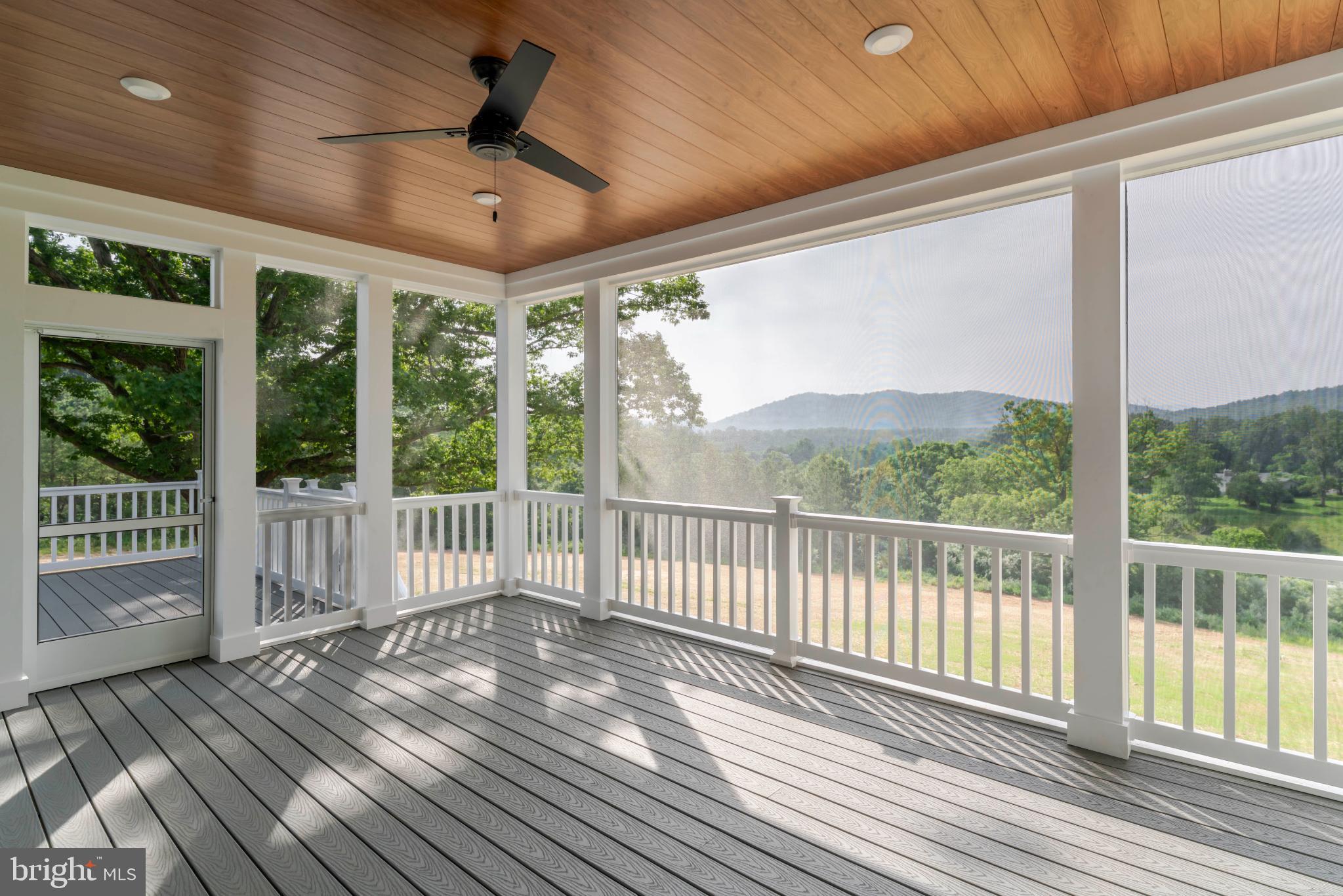 623 Traveller Court Lothian, MD 20711 - Photo 46 of 76 Serene porch with mountain views.