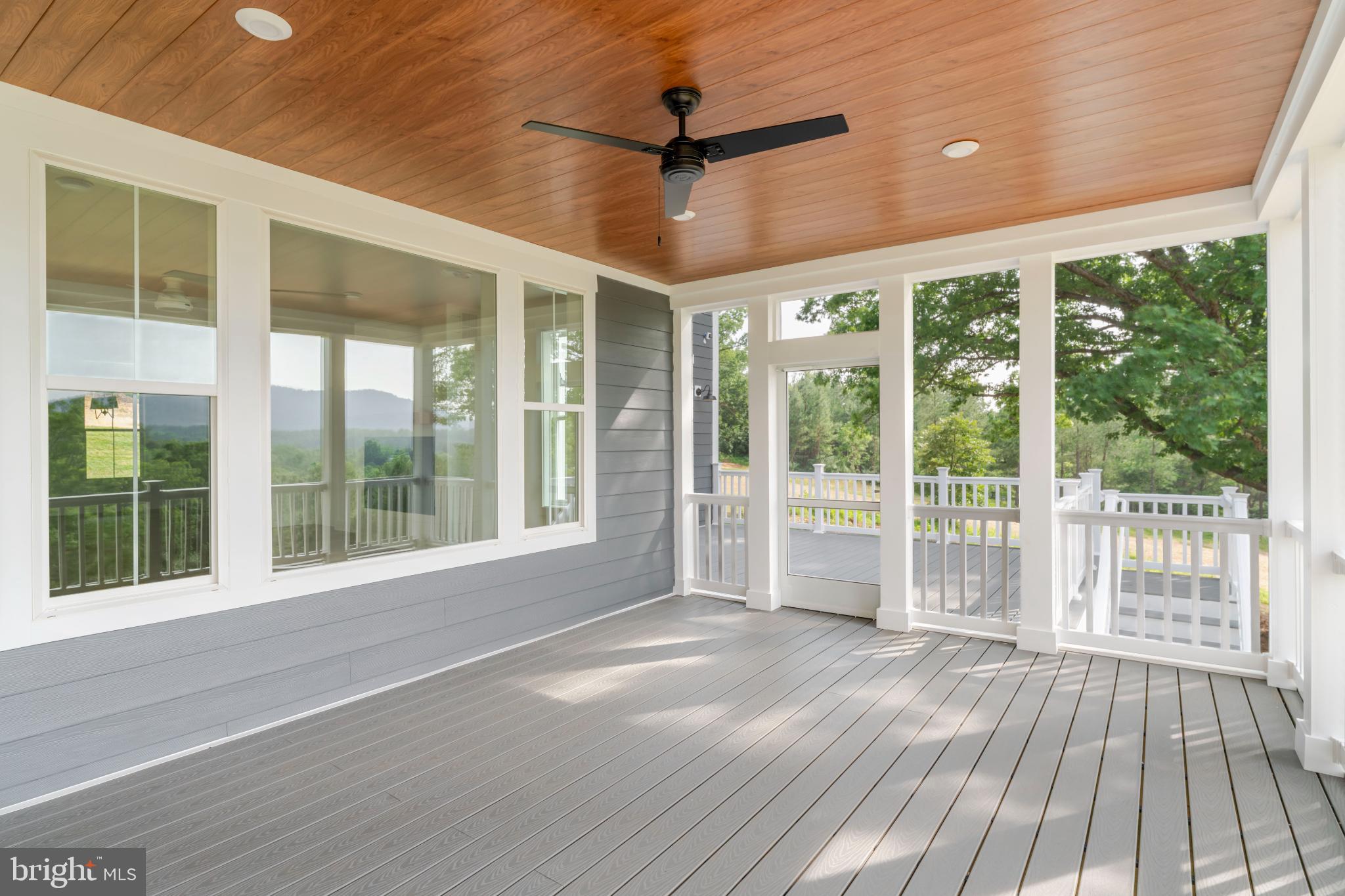 623 Traveller Court Lothian, MD 20711 - Photo 47 of 76 Serene porch with scenic views and natural light.