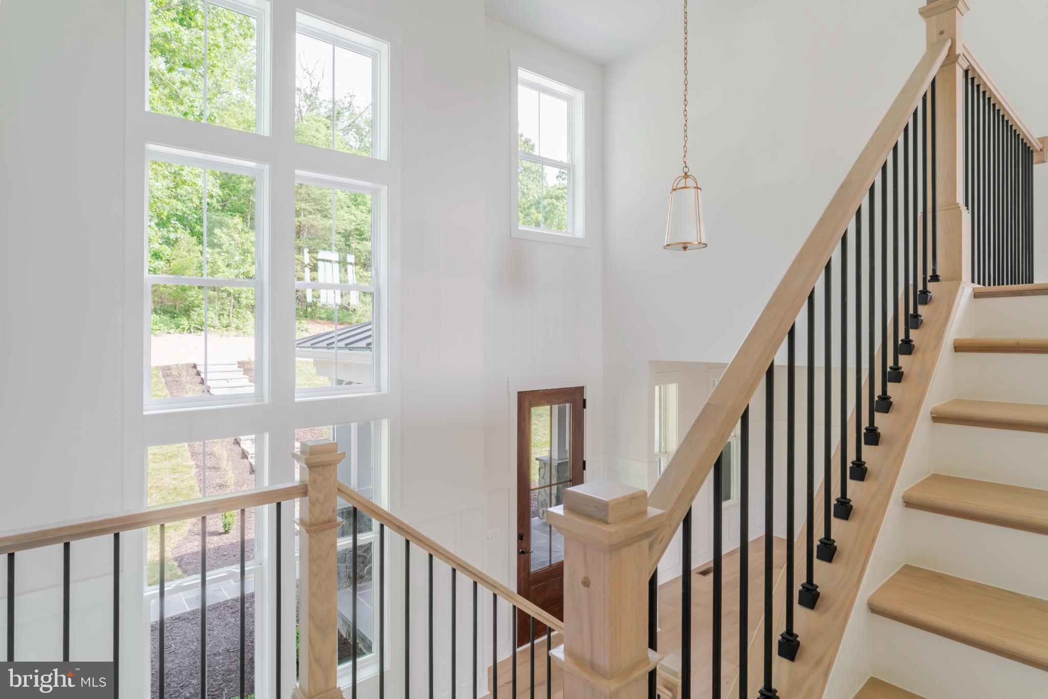 623 Traveller Court Lothian, MD 20711 - Photo 48 of 76 Bright and airy entryway with modern charm.