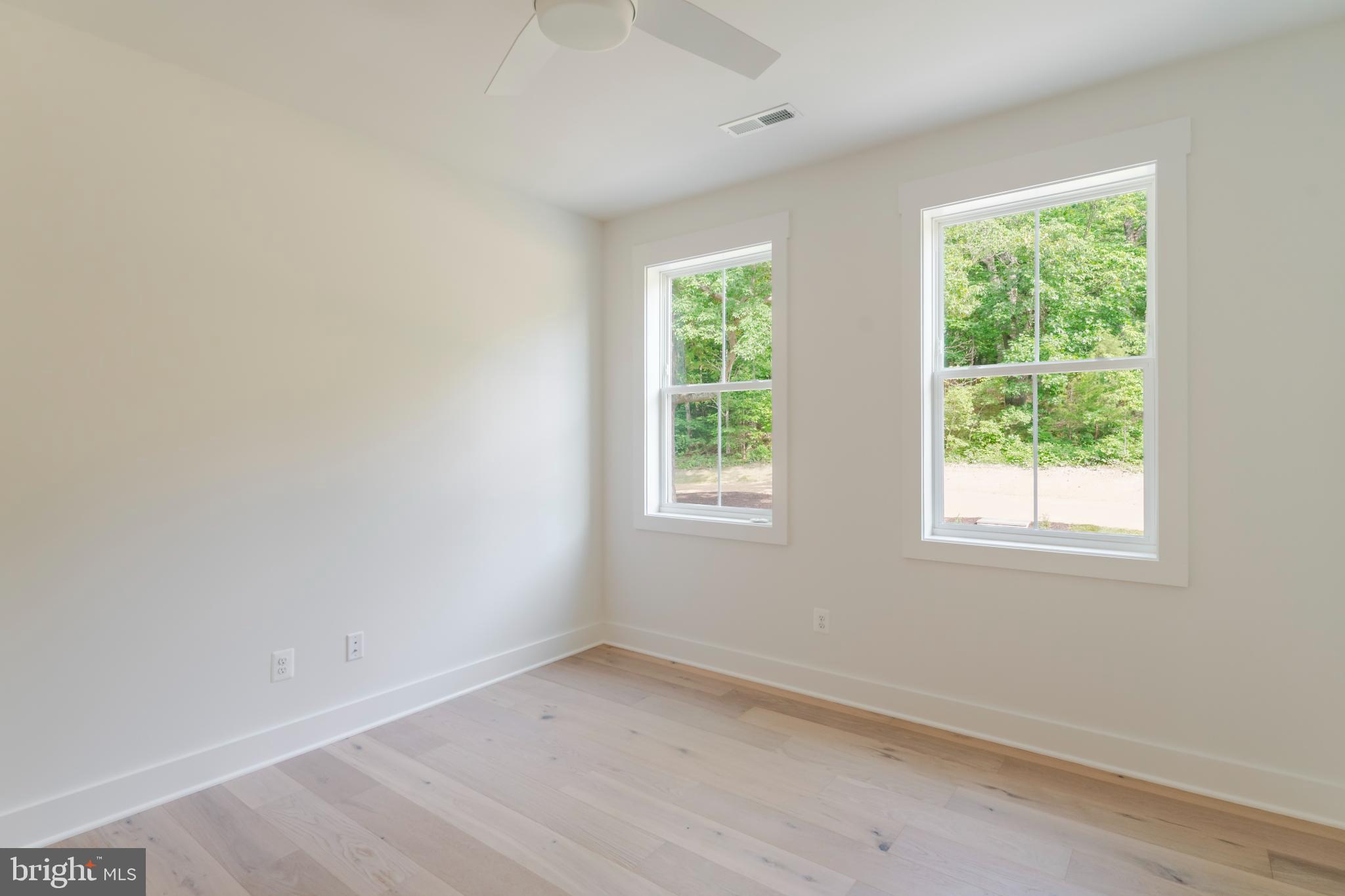 623 Traveller Court Lothian, MD 20711 - Photo 50 of 76 Bright and airy room with nature views.