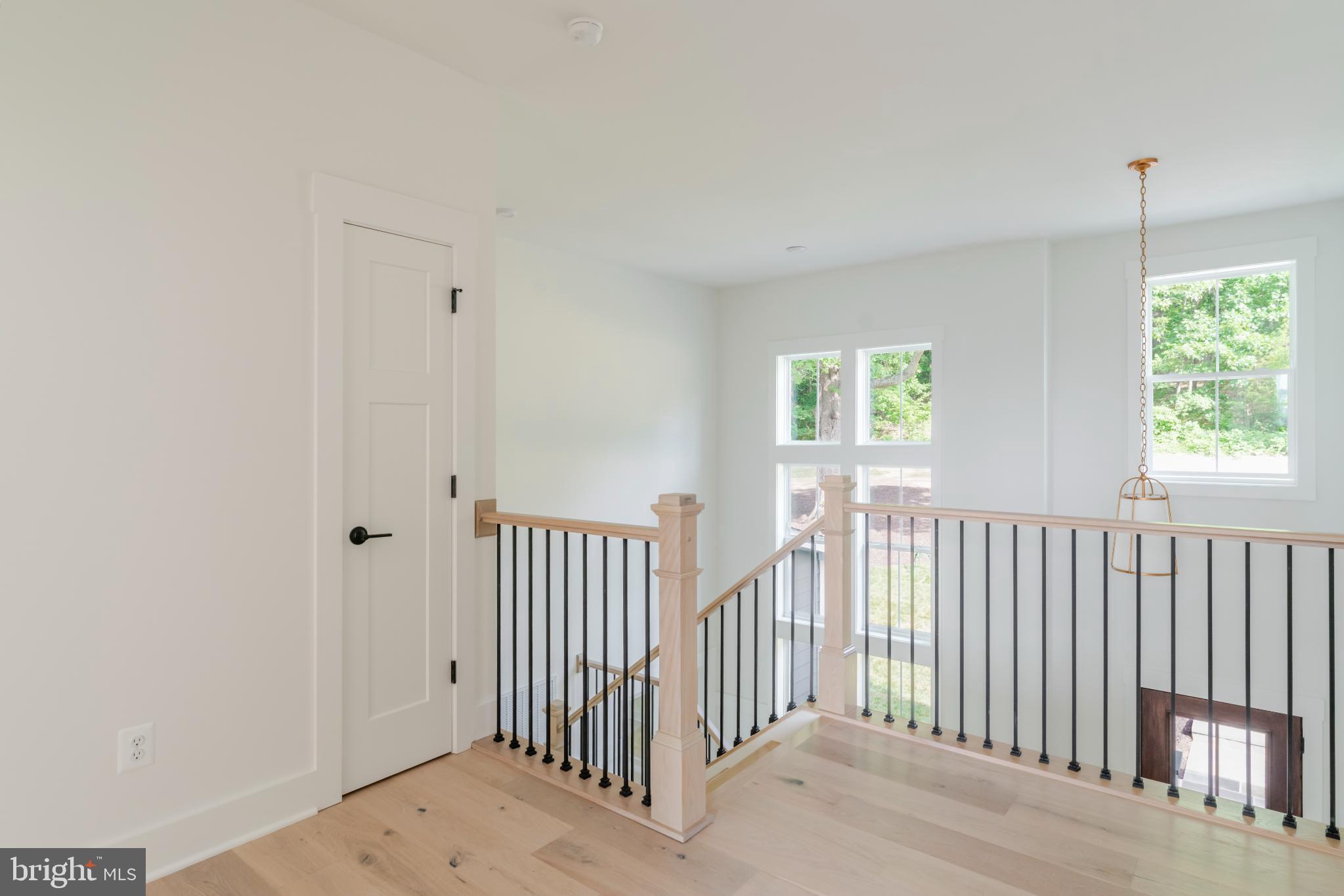 623 Traveller Court Lothian, MD 20711 - Photo 54 of 76 Bright and airy landing with modern finishes.