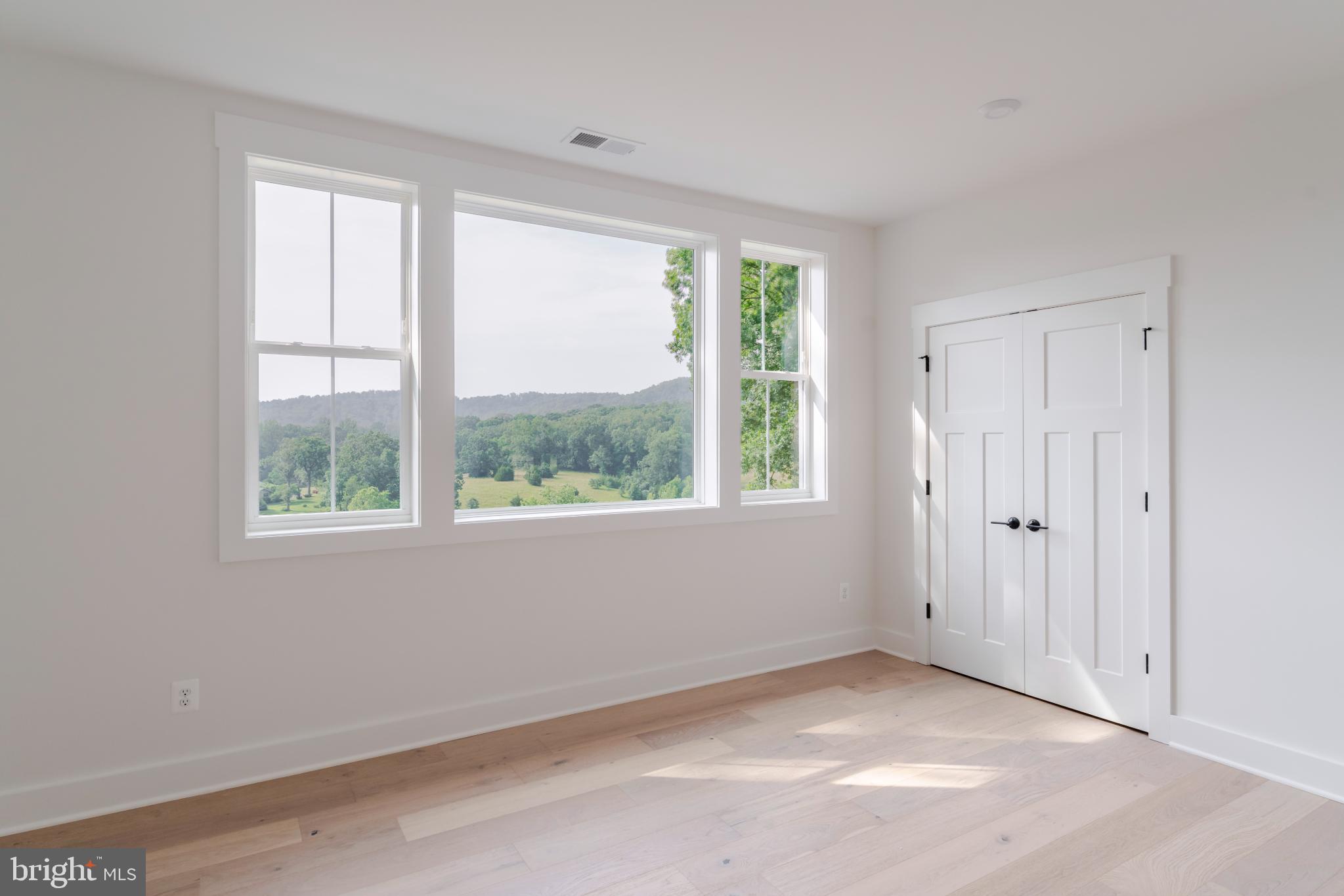 623 Traveller Court Lothian, MD 20711 - Photo 56 of 76 Bright, airy room with scenic views.