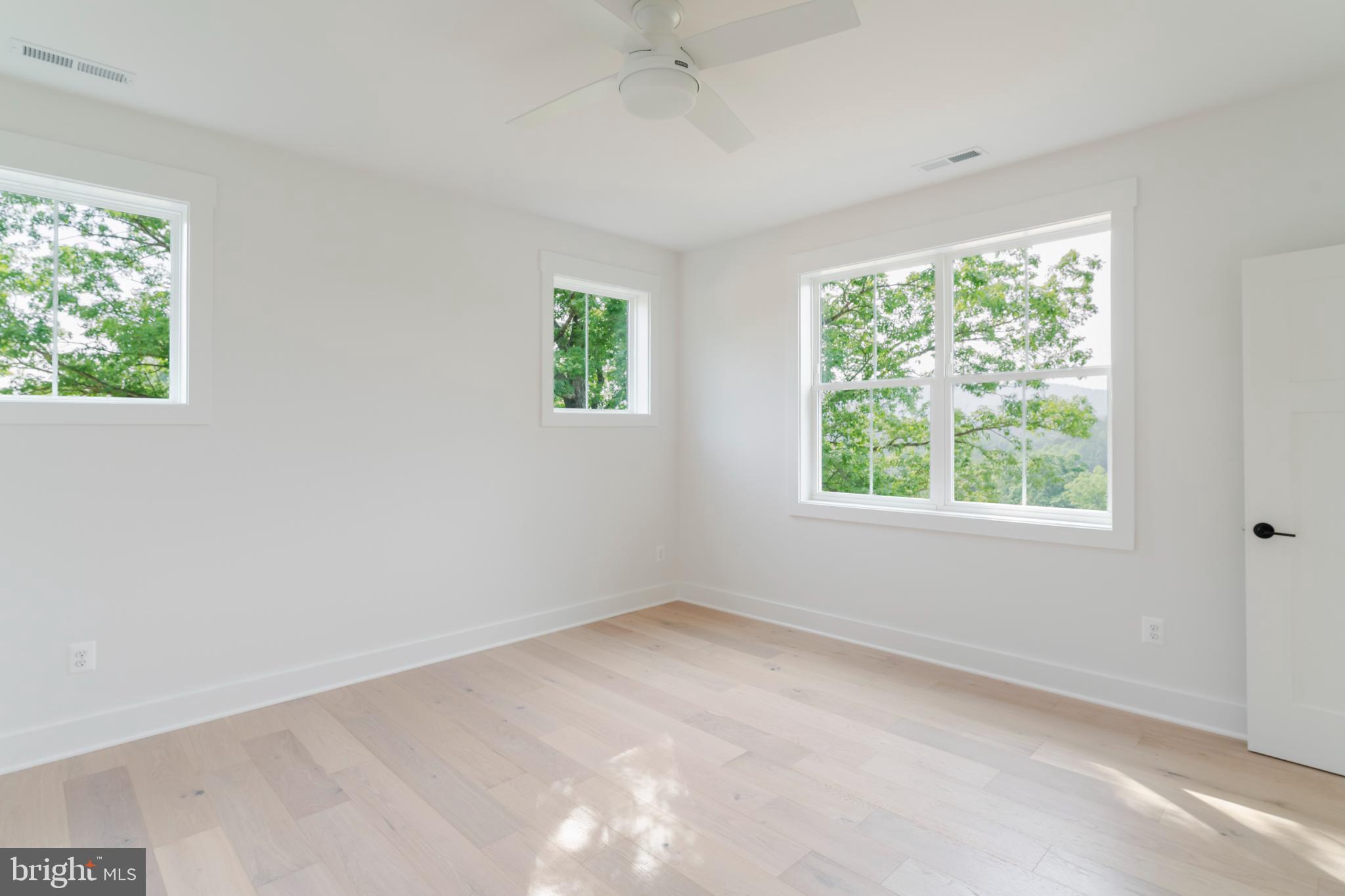 623 Traveller Court Lothian, MD 20711 - Photo 59 of 76 Bright, airy room with scenic views.