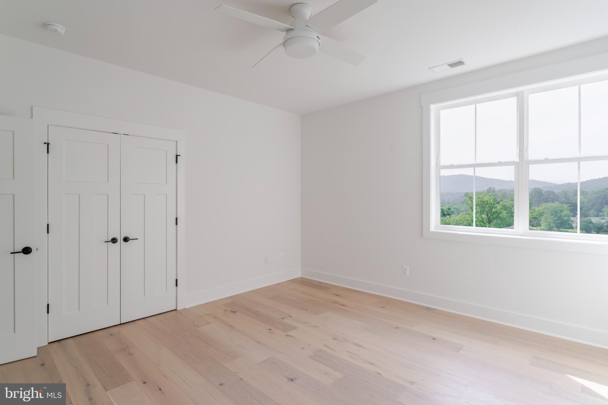 623 Traveller Court Lothian, MD 20711 - Photo 62 of 76 Bright and airy minimalist bedroom retreat.
