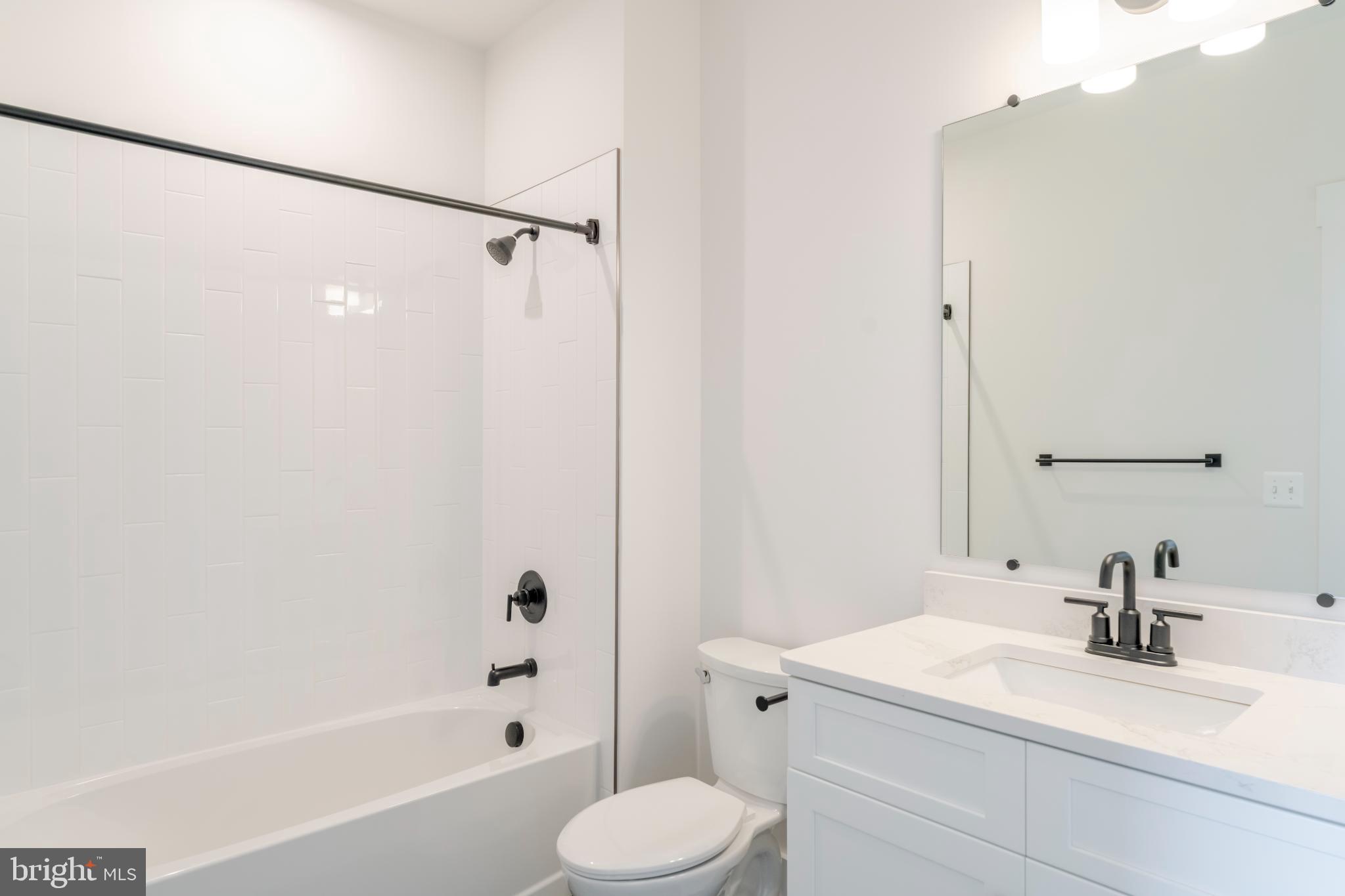 623 Traveller Court Lothian, MD 20711 - Photo 64 of 76 Sleek modern bathroom with elegant finishes.
