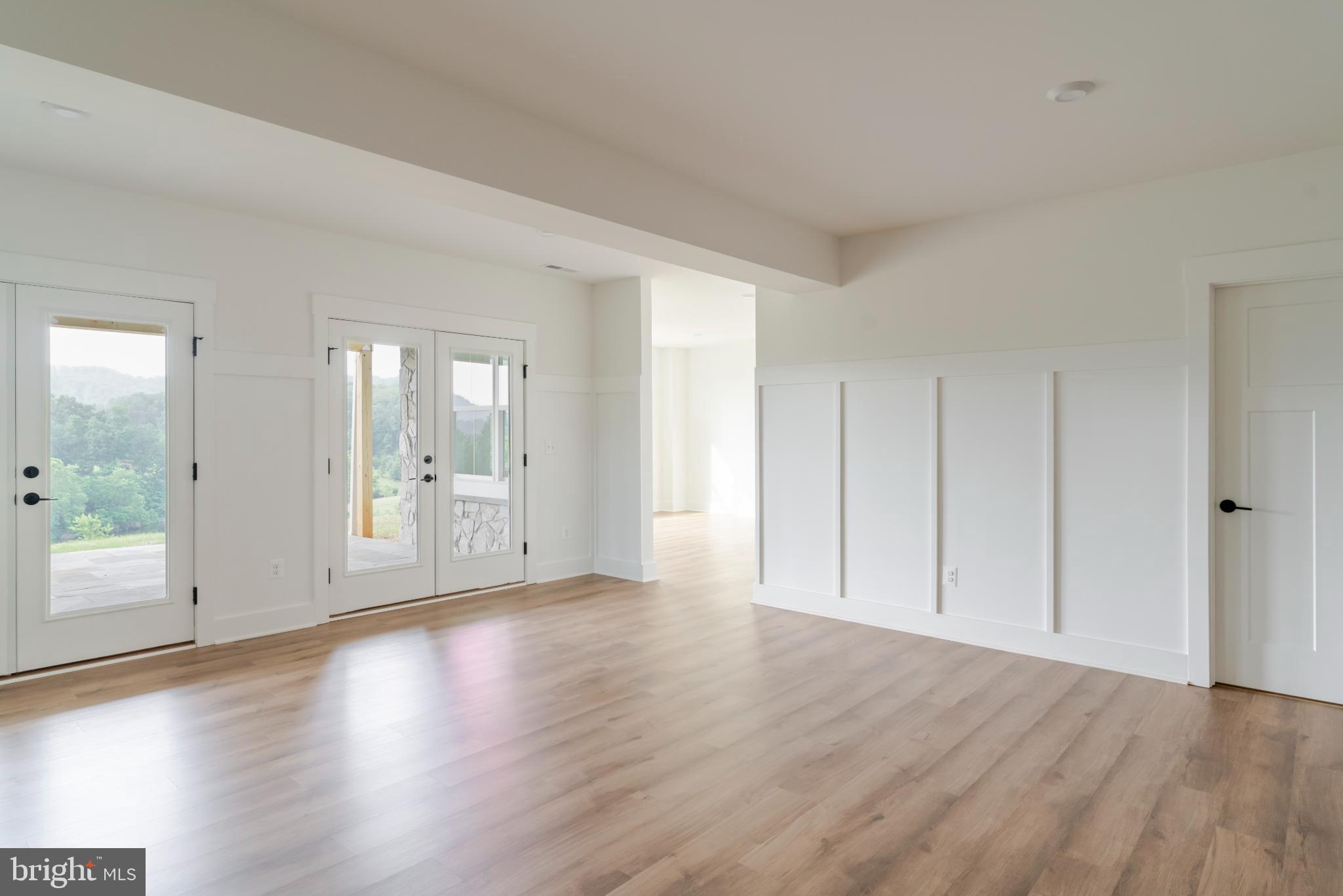 623 Traveller Court Lothian, MD 20711 - Photo 66 of 76 Spacious, light-filled living area awaits you.