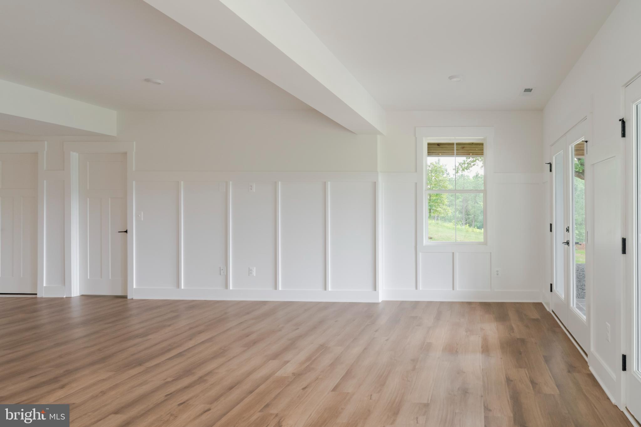 623 Traveller Court Lothian, MD 20711 - Photo 67 of 76 Spacious, light-filled room with elegant trim.