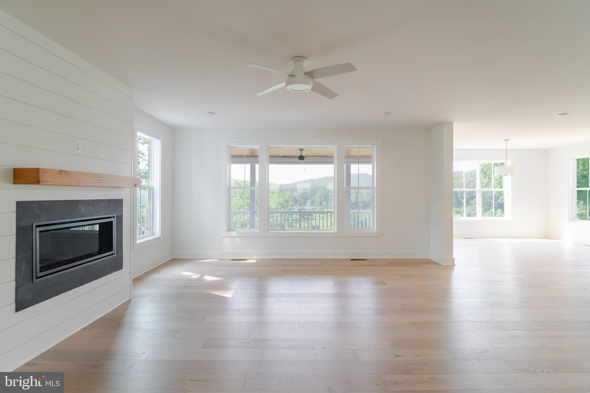 623 Traveller Court Lothian, MD 20711 - Photo 7 of 76 Bright, airy space with scenic views.