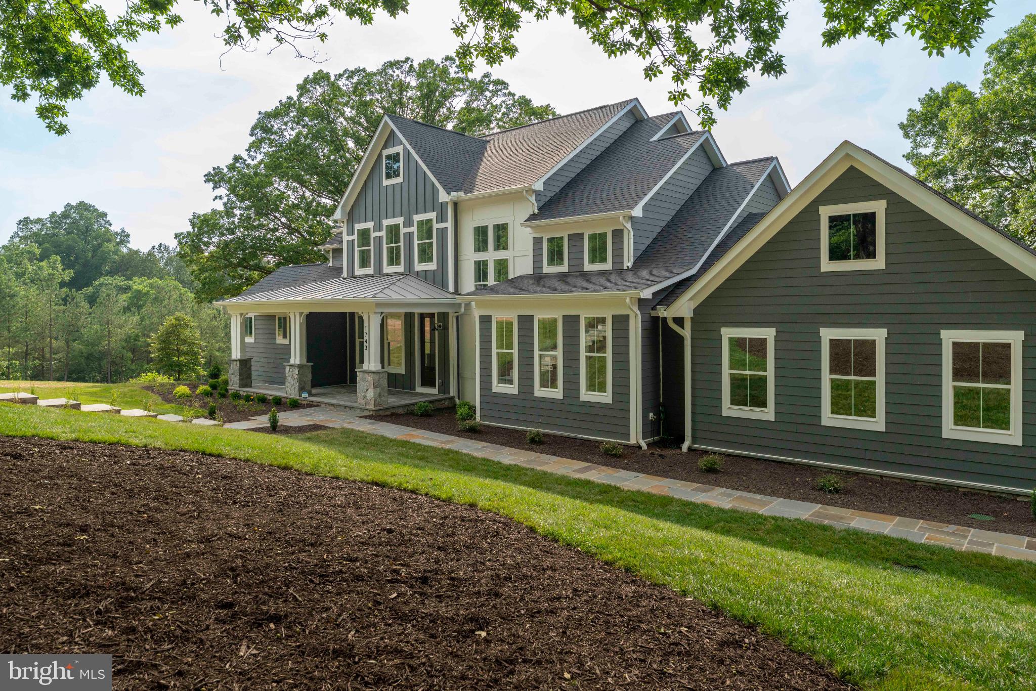 623 Traveller Court Lothian, MD 20711 - Photo 75 of 76 Charming modern home nestled in lush greenery.