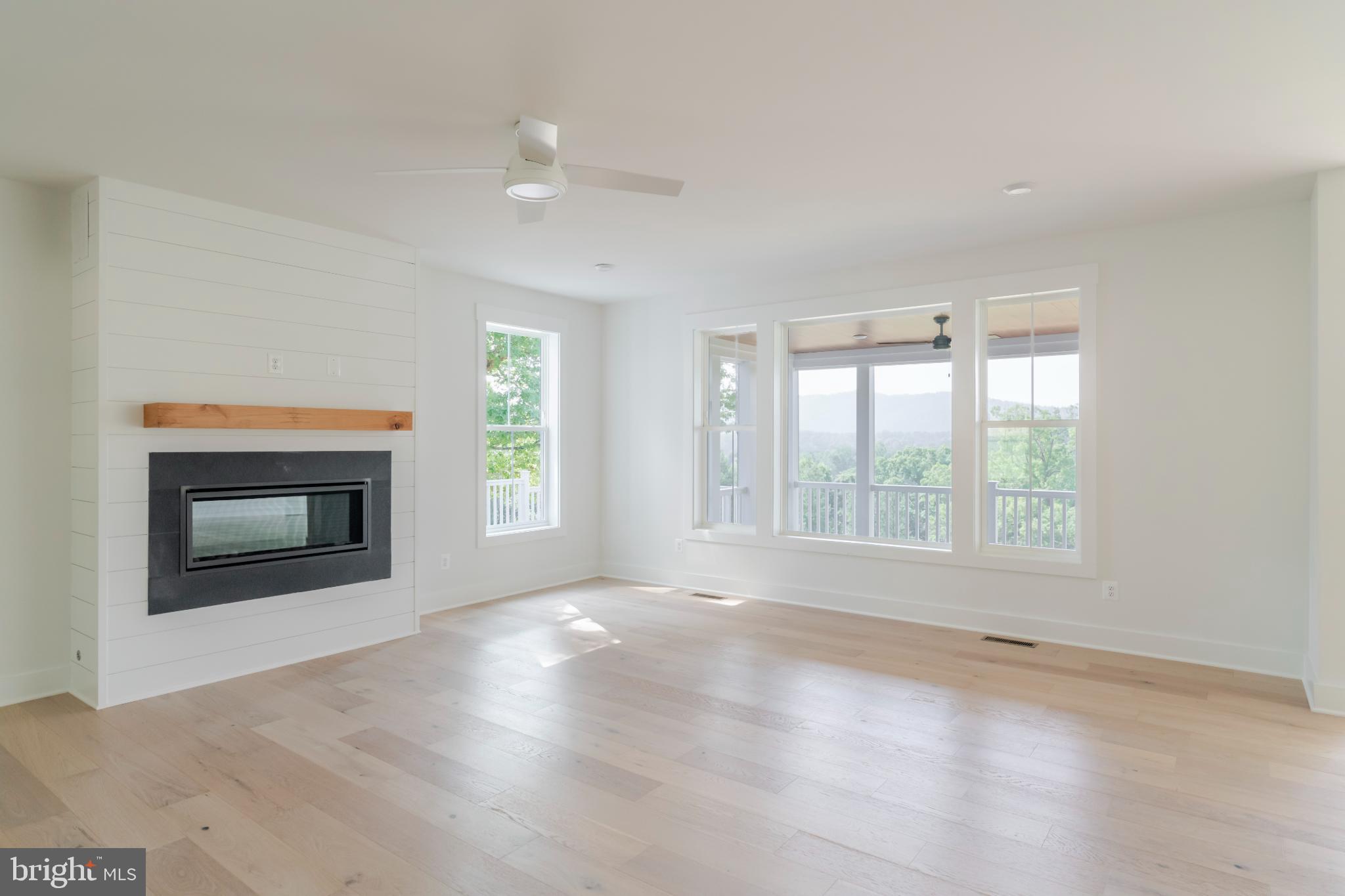 623 Traveller Court Lothian, MD 20711 - Photo 8 of 76 Bright, airy space with scenic views.