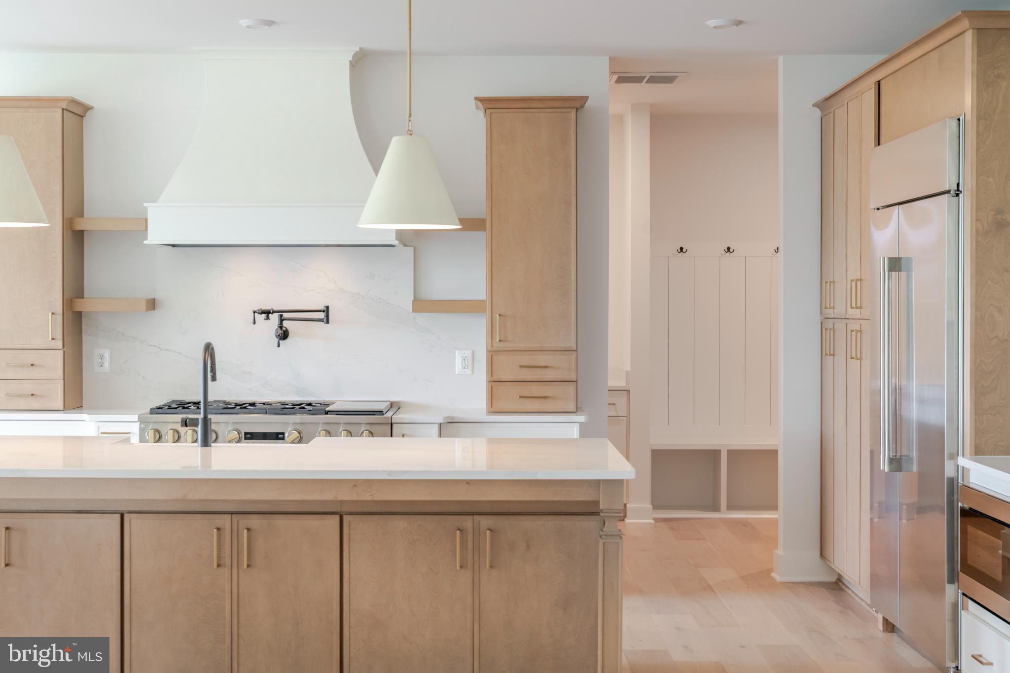 623 Traveller Court Lothian, MD 20711 - Photo 10 of 76 Modern kitchen with sleek cabinetry and light.