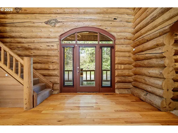 a view of entryway with wooden floor