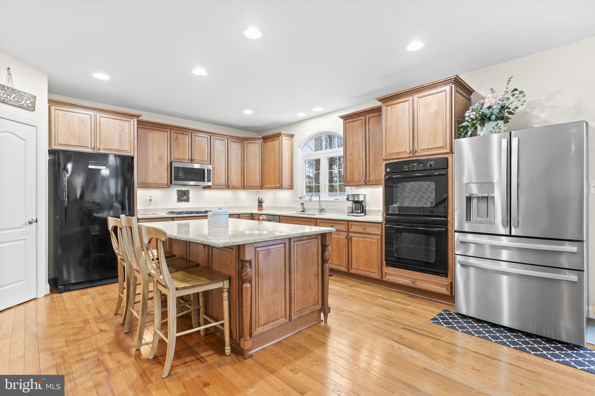 3283 Huntsman Drive Huntingtown, MD 20639 - Photo 14 of 77 Grand kitchen with upgraded maple cabinetry