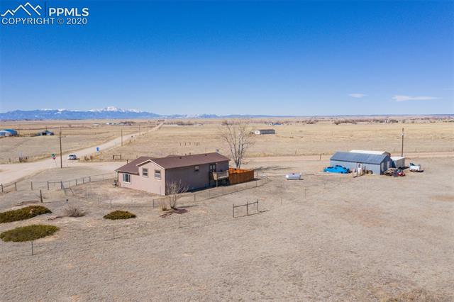 5925 North Log Road Calhan, CO 80808 - Photo 7 of 39