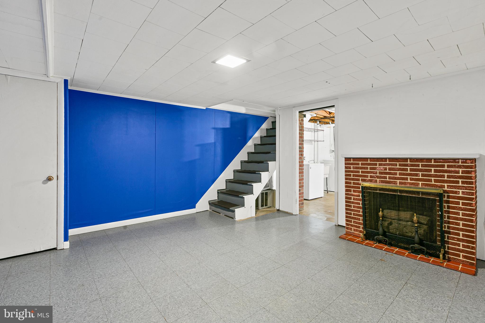 5600 Braxfield Road Halethorpe, MD 21227 - Photo 23 of 32 Recreation Room w/ Gas Fireplace