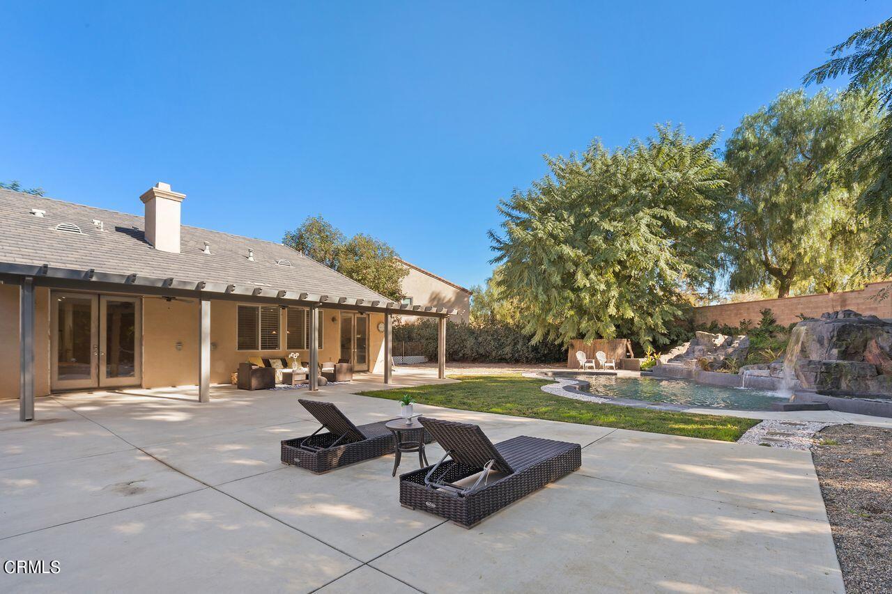 11249 Figtree Terrace Road Corona, CA 92883 - Photo 35 of 53 a view of a house with swimming pool and sitting area