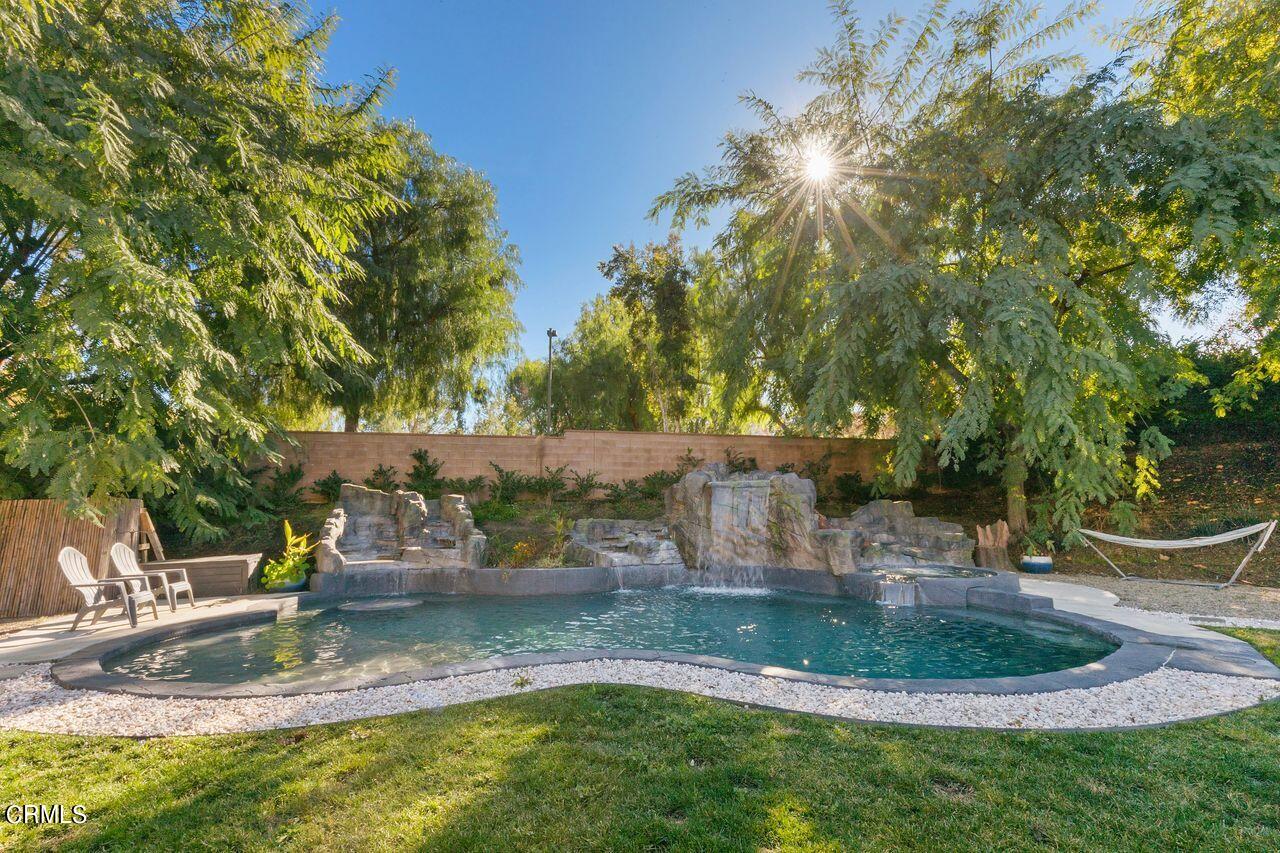 11249 Figtree Terrace Road Corona, CA 92883 - Photo 37 of 53 a view of a yard with a fountain