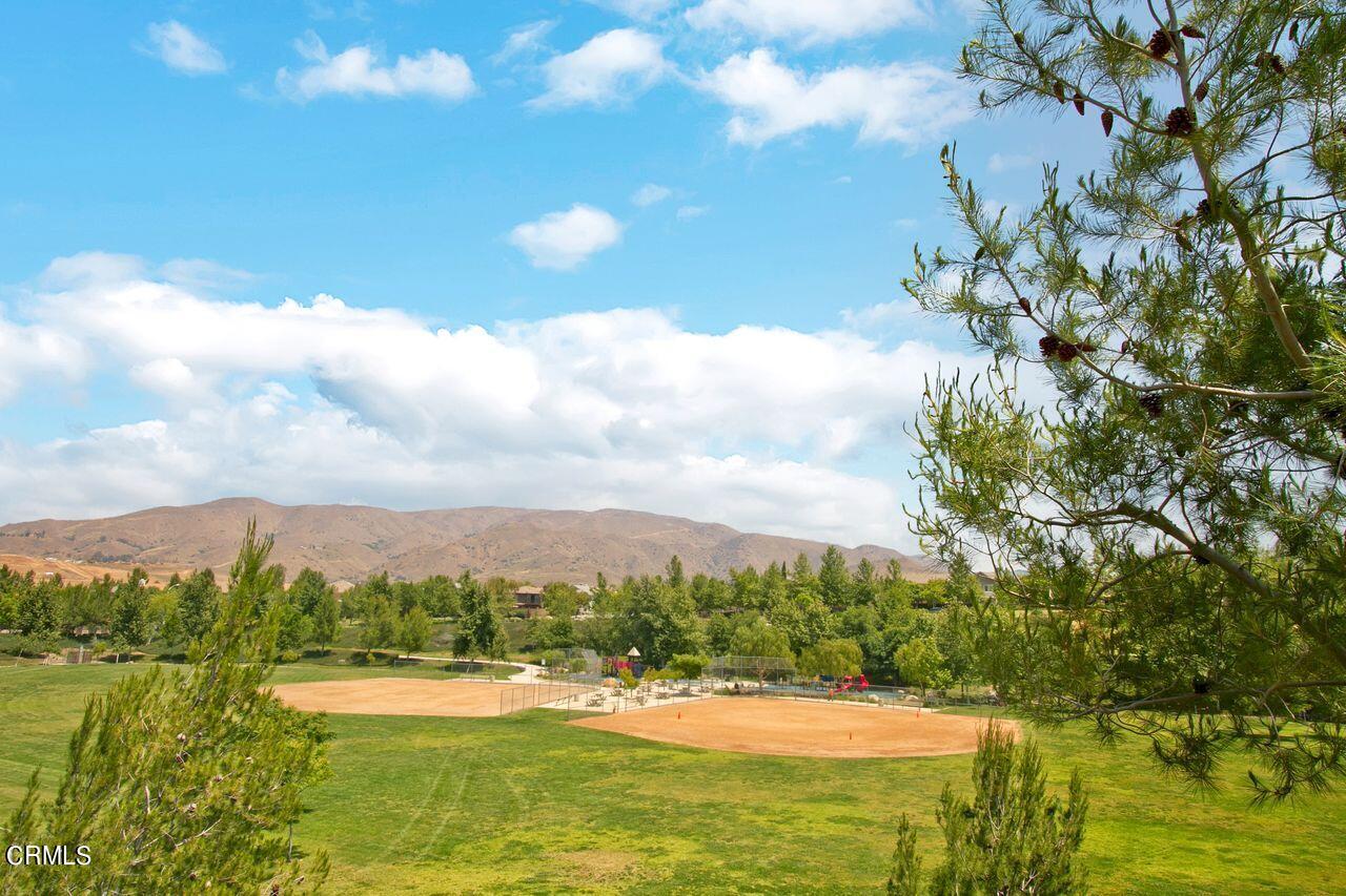 11249 Figtree Terrace Road Corona, CA 92883 - Photo 49 of 53 a view of lake with green space