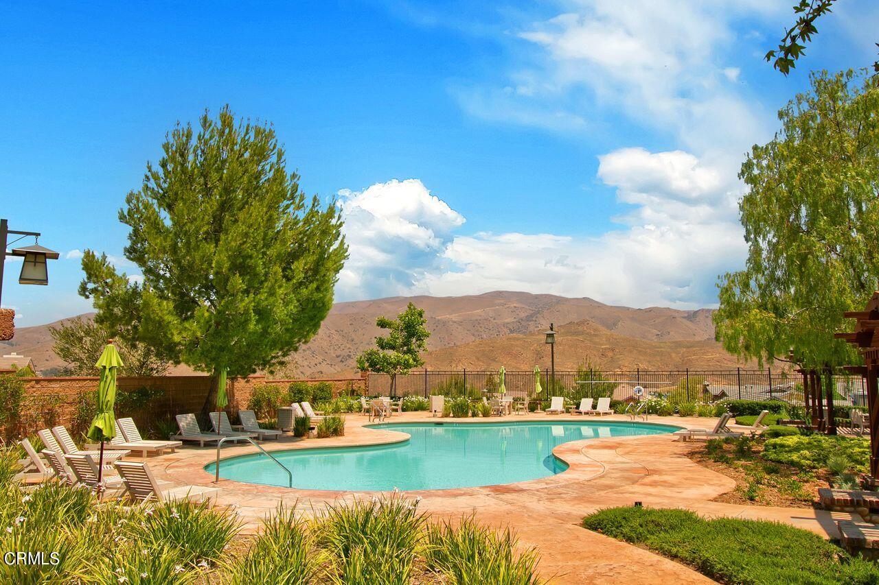 11249 Figtree Terrace Road Corona, CA 92883 - Photo 51 of 53 a view of a lake with a house in the background