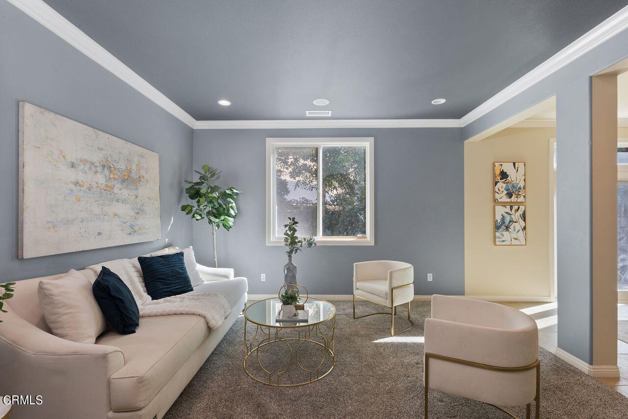 11249 Figtree Terrace Road Corona, CA 92883 - Photo 6 of 53 a living room with furniture and a large window