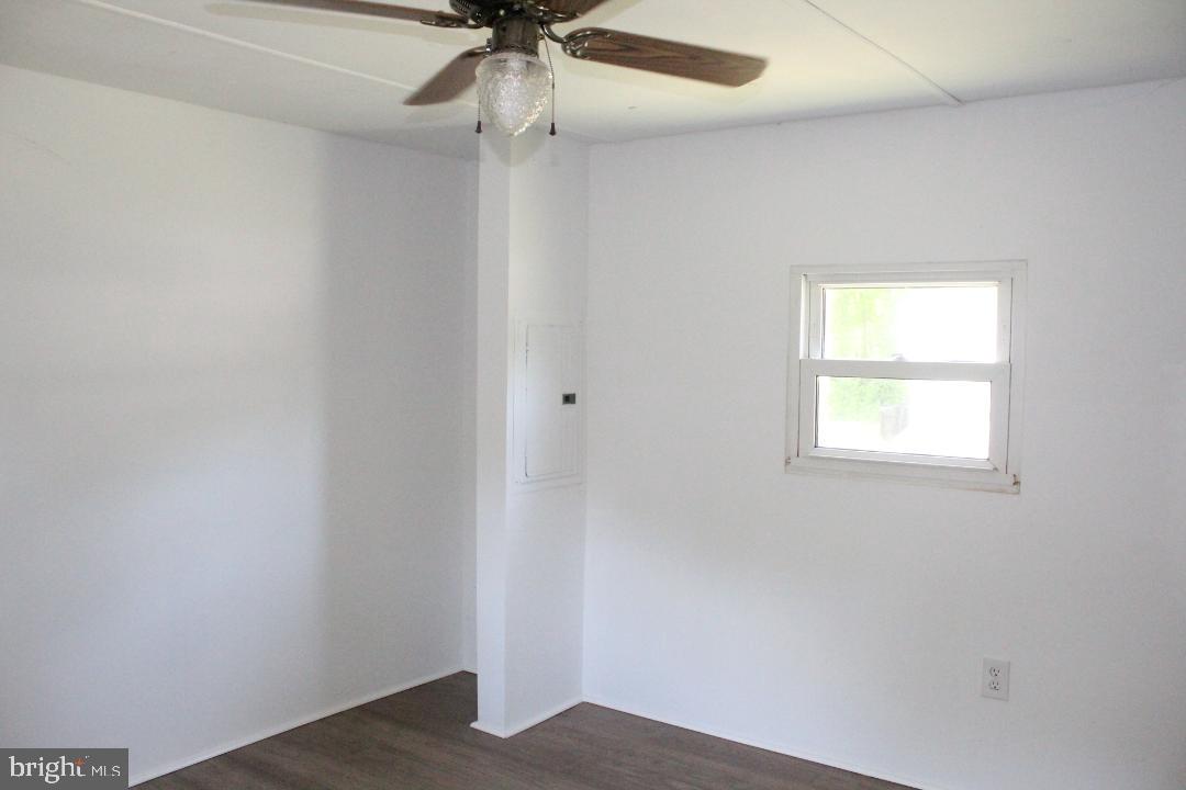 1762 Crown Point Road, Unit 2310B West Deptford, NJ 08086 - Photo 26 of 39 an empty room with a window and a fan