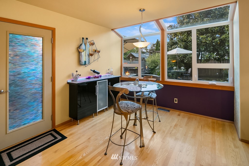 932 South 32nd Place Renton, WA 98055 - Photo 13 of 31 a table and chairs in a room next to a window