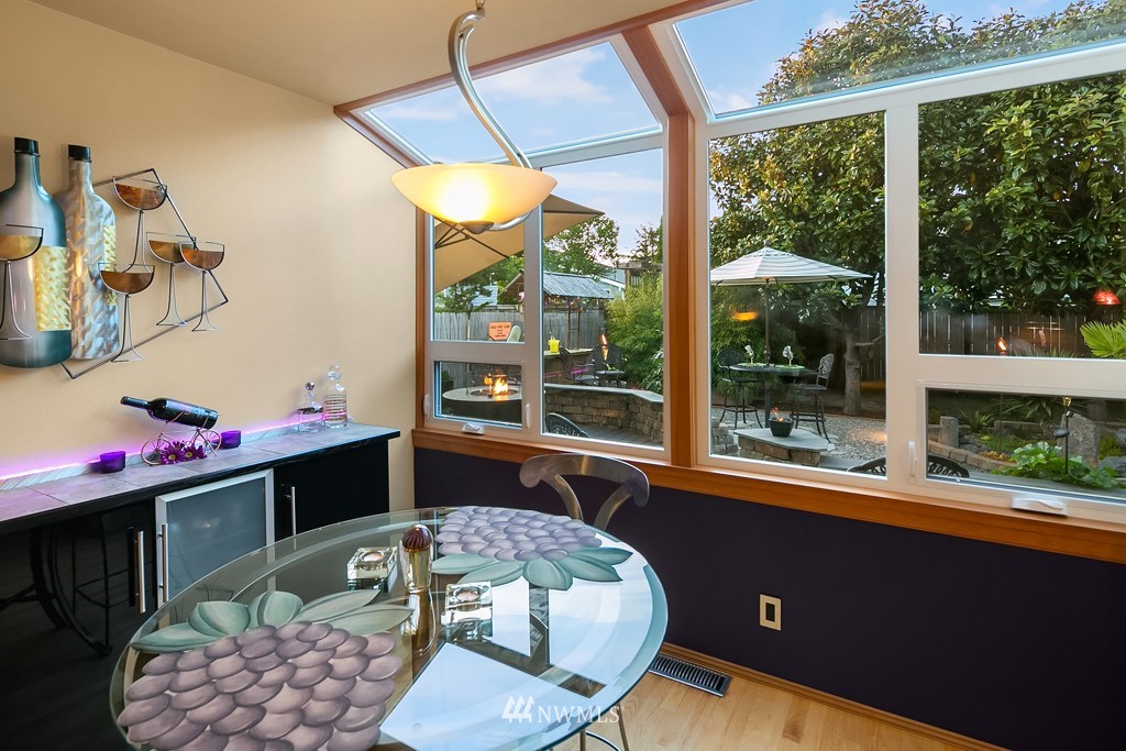 932 South 32nd Place Renton, WA 98055 - Photo 14 of 31 a living room with furniture and a floor to ceiling window