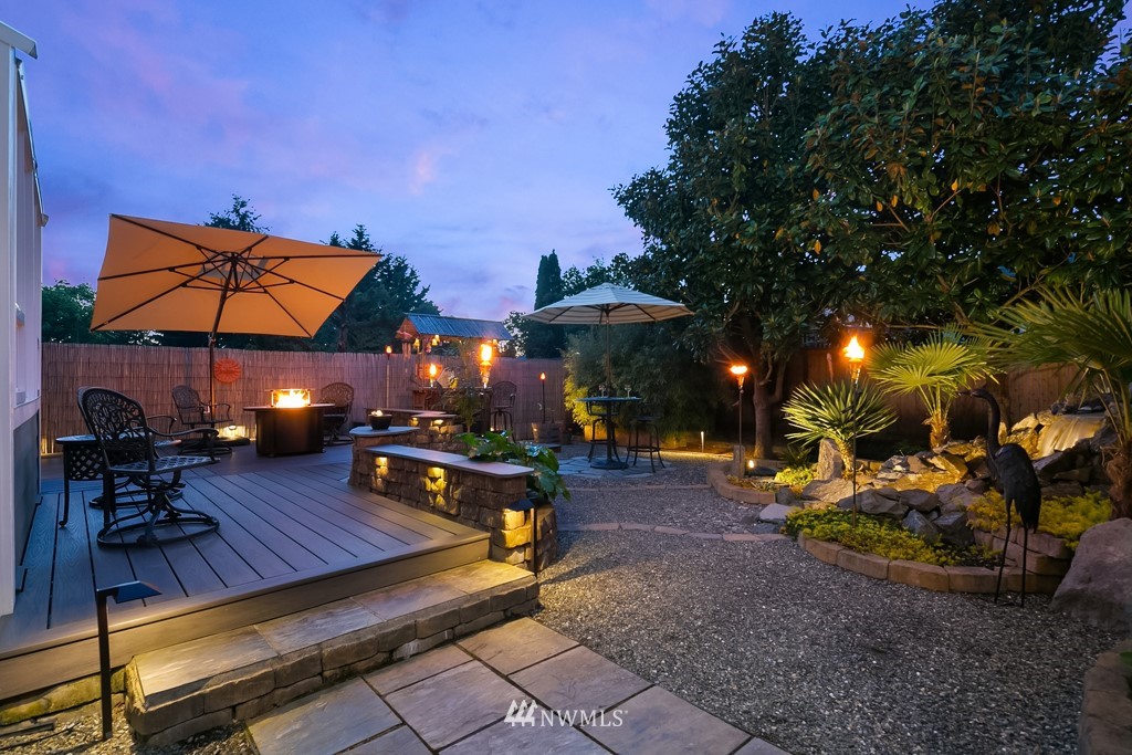 932 South 32nd Place Renton, WA 98055 - Photo 3 of 31 a view of a wooden chairs in patio