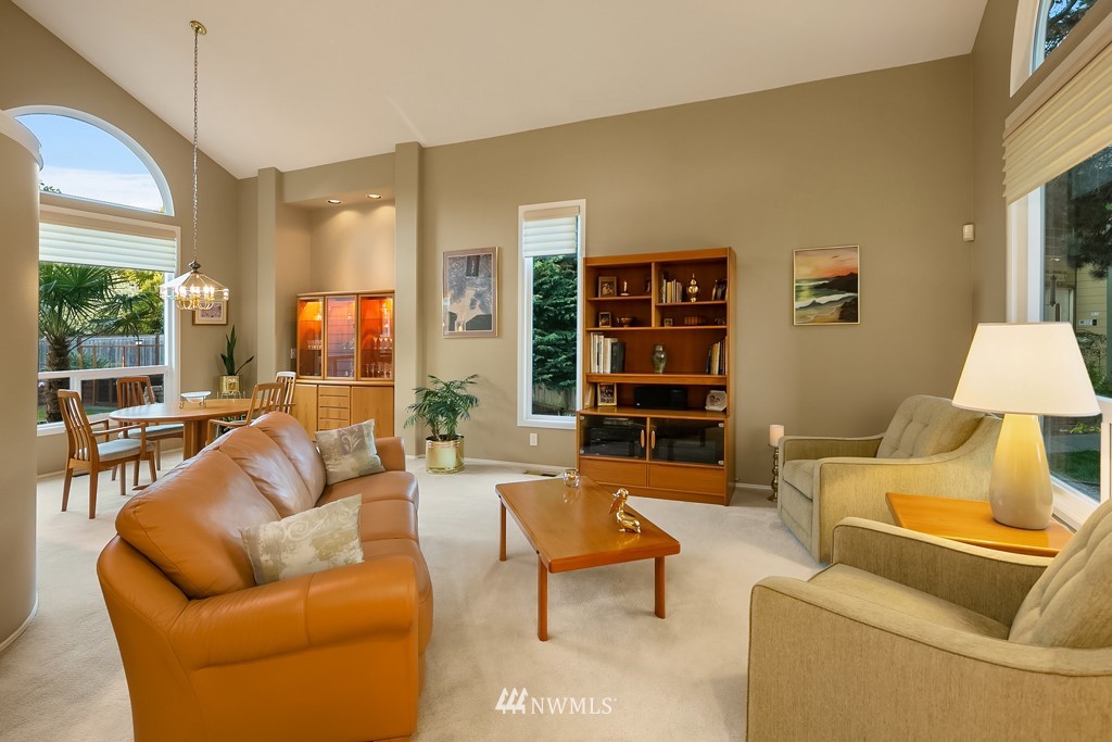 932 South 32nd Place Renton, WA 98055 - Photo 7 of 31 a living room with furniture and a lamp
