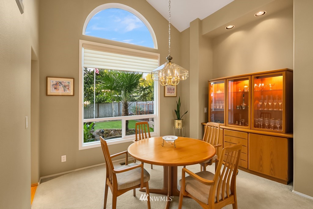 932 South 32nd Place Renton, WA 98055 - Photo 8 of 31 a view of a dining room with furniture window and outside view