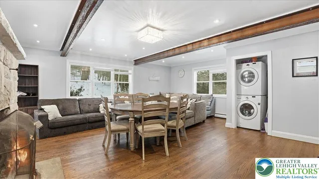 a kitchen with stainless steel appliances granite countertop a stove and a refrigerator