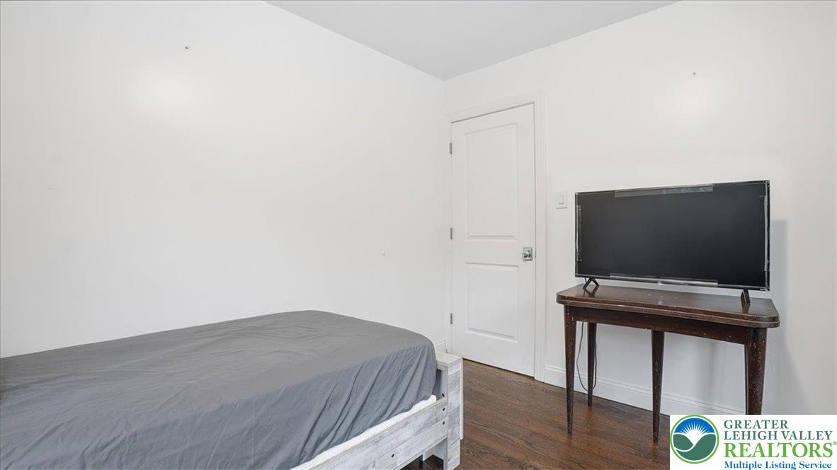 172 Evergreen Hollow Road Effort, PA 18330 - Photo 29 of 70 a room with a bed and a flat screen tv