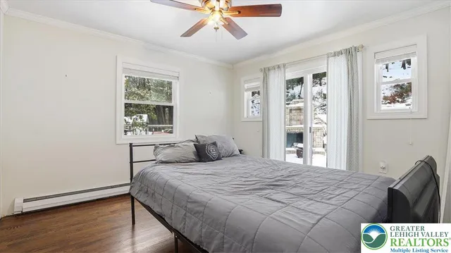 a view of storage and utility room with a window