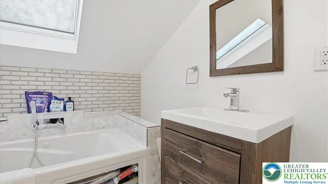 a view of a hall with wooden floor