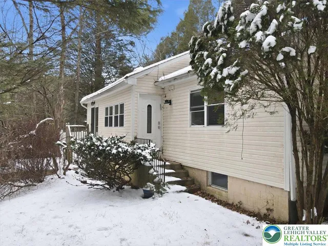 a view of mountain view with lots of trees
