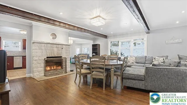 a kitchen with stainless steel appliances a refrigerator sink and cabinets