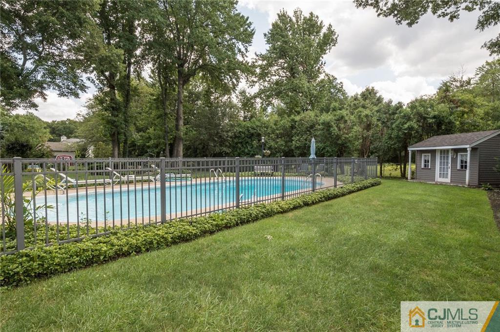 5 Utica Road Edison, NJ 08820 - Photo 2 of 48 a view of a house with backyard and deck