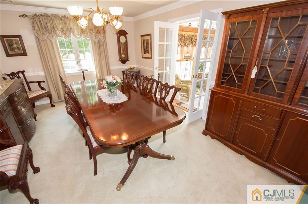 5 Utica Road Edison, NJ 08820 - Photo 20 of 48 a view of a dining room with furniture window and outside view