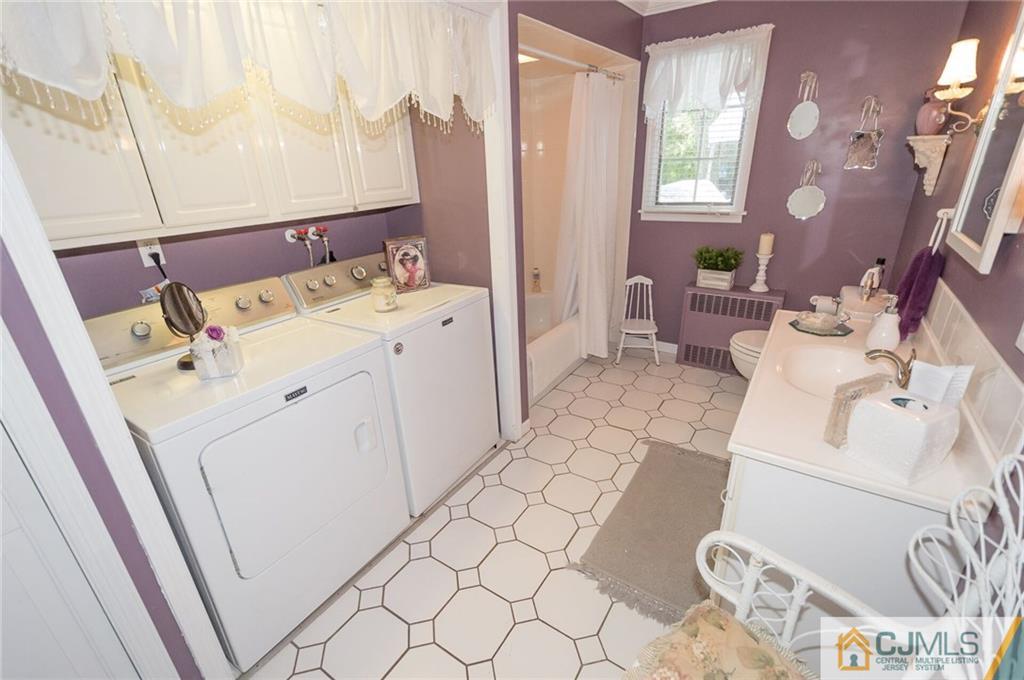 5 Utica Road Edison, NJ 08820 - Photo 22 of 48 a utility room with dryer and washer