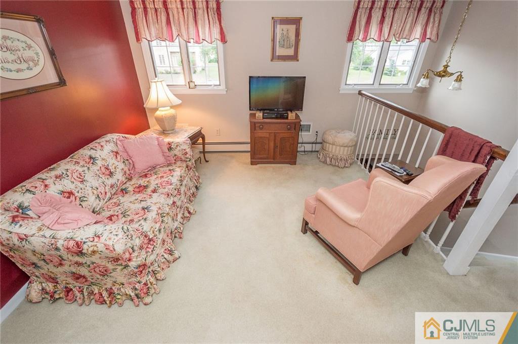 5 Utica Road Edison, NJ 08820 - Photo 30 of 48 a living room with furniture and a flat screen tv
