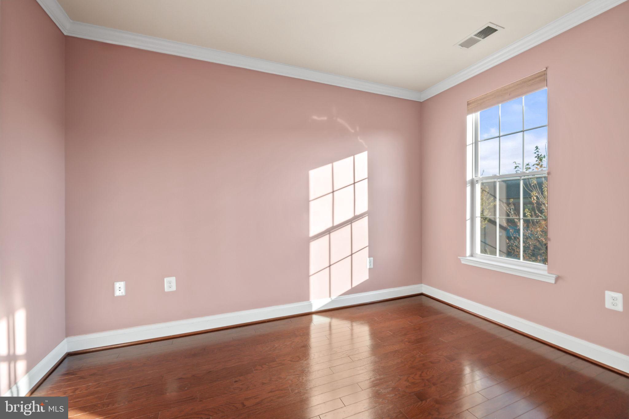 7676 Maple Lawn Boulevard, Unit 2 Fulton, MD 20759 - Photo 11 of 38 Sunlit serenity in a pastel-hued room.
