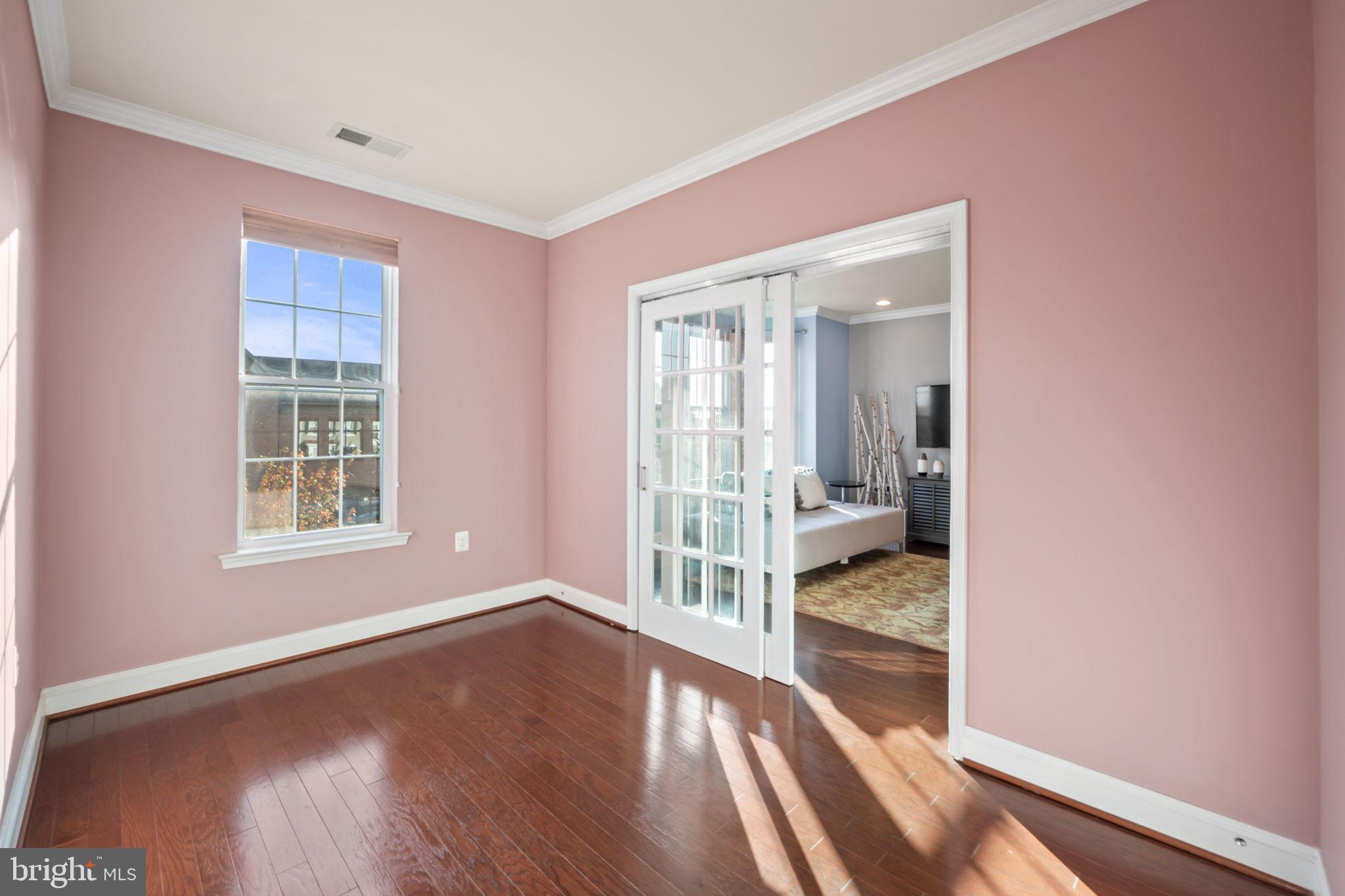 7676 Maple Lawn Boulevard, Unit 2 Fulton, MD 20759 - Photo 12 of 38 Bright, airy room with elegant French doors.