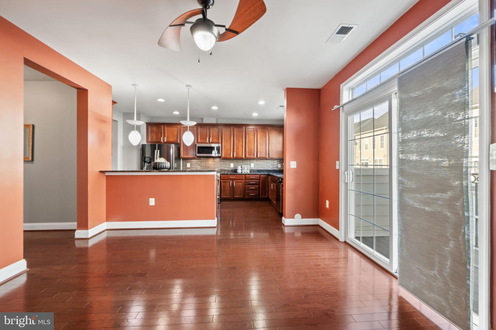 7676 Maple Lawn Boulevard, Unit 2 Fulton, MD 20759 - Photo 18 of 38 Modern kitchen with warm, inviting tones.